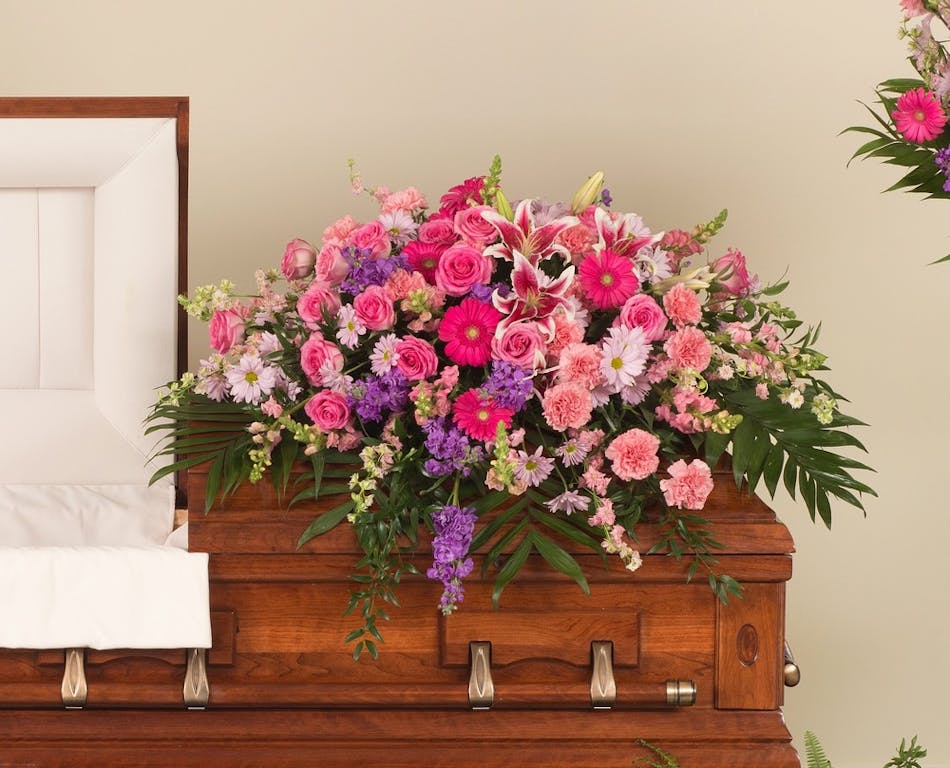 Delicate Pink and Lavender Casket Spray Stadium Flowers